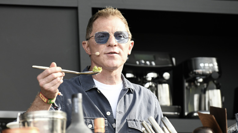 Bobby Flay speaks at a cooking demonstration