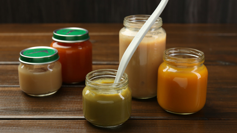 Different sized jars of baby food.