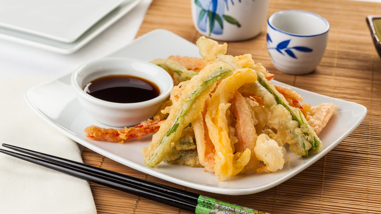 Plate of veggie tempura with sauce