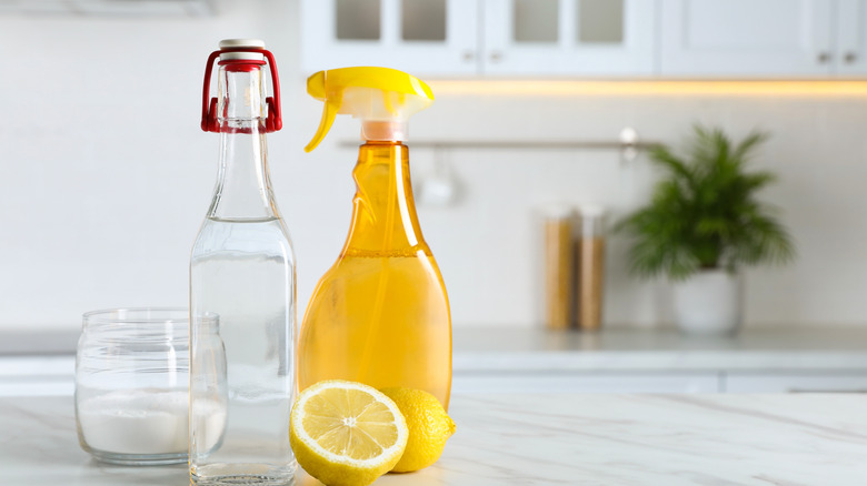 natural cleaning products on a marble counter