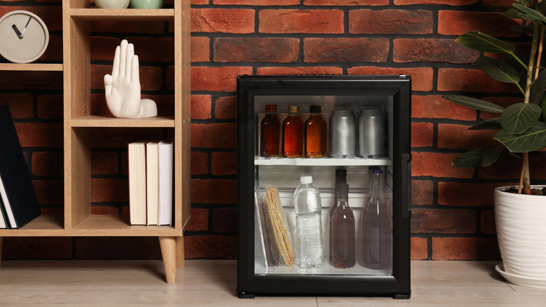 Mini fridge with snacks and drinks