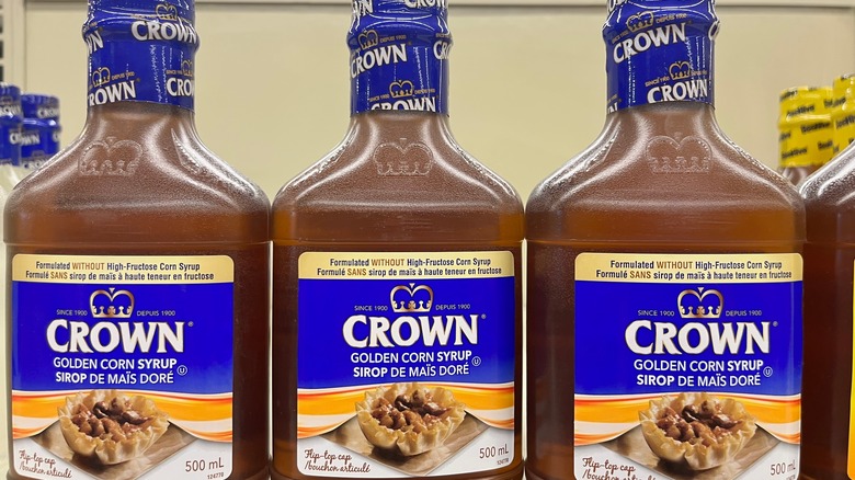 bottles of golden corn syrup on display