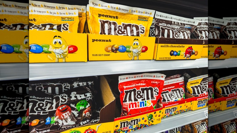 A close up of M&M's peanuts bag with a focus on the logo