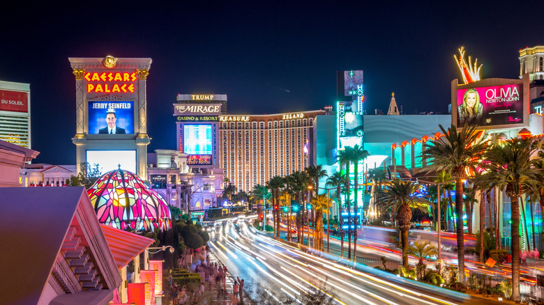 View of the Las Vegas Strip at night, with Caesars Palace and Treasure Island in the shot