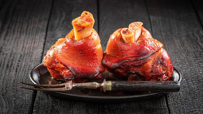 Roasted ham hocks on platter