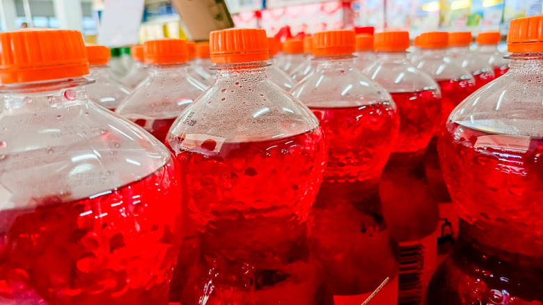 Close up of rows of red soda