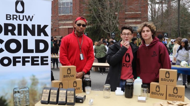 Max Feber with two friends selling Bruw kits on college campus