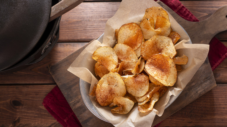 Potato chips sit in basket