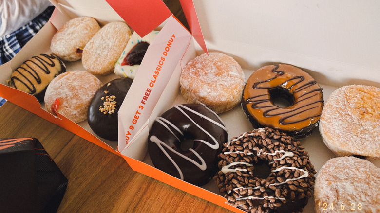 Two boxes of donuts from Dunkin.