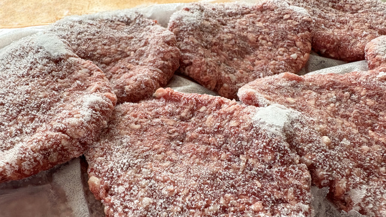 A closeup of frozen beef patties.
