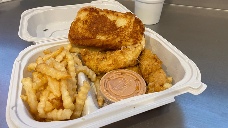 A chicken finger meal with fries, Texas Toast, and a drink from Raising Cane's