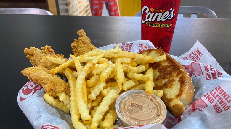 A chicken finger meal with fries, Texas Toast, and a drink from Raising Cane's