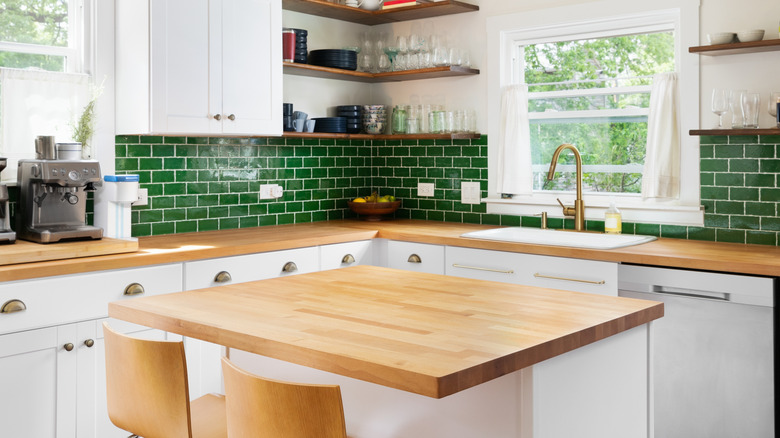 Small kitchen with island in the middle