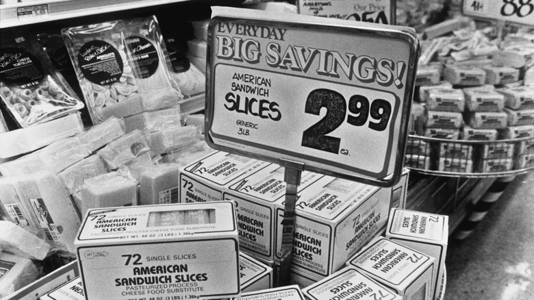 20th century supermarket display for a sale on American cheese slices