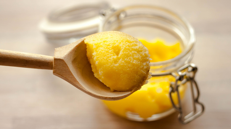 spoonful of ghee from jar