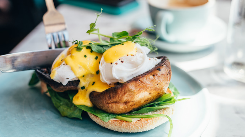 poached eggs with hollandaise on English muffins