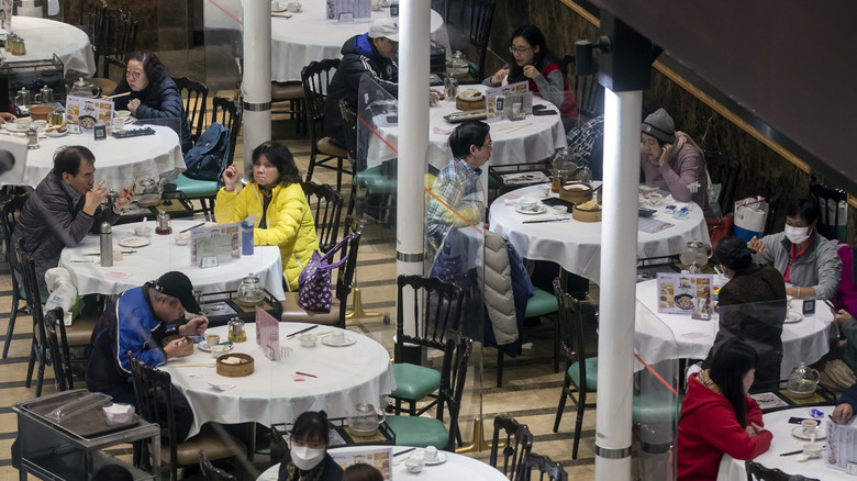 Round tables in a Hong Kong dim sum restaurant.