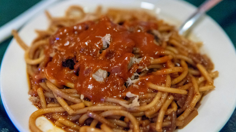 A saucy Memphis-style BBQ pasta served on a white plate.