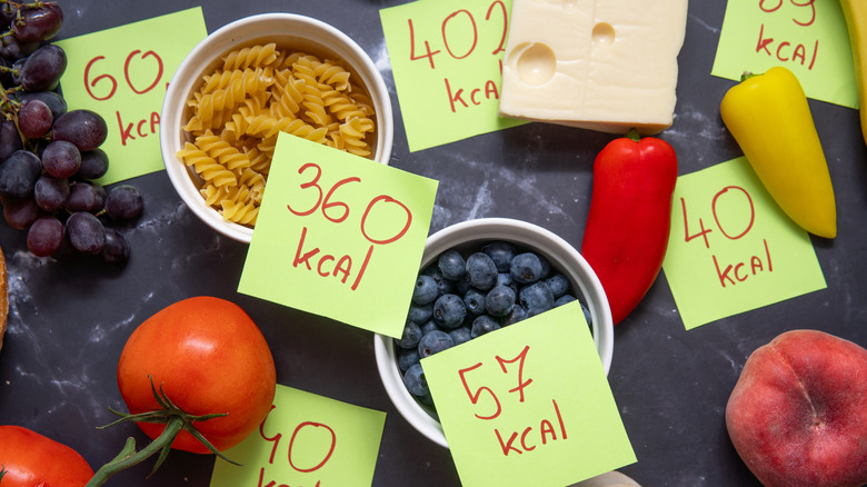 Different foods labeled with their calorie content