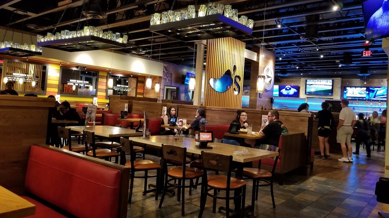 Customers dine inside a Chili's restaurant