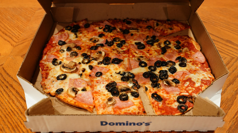 Ham, mushroom, and black olive square cut pizza from a Wisconsin Domino's in 2025