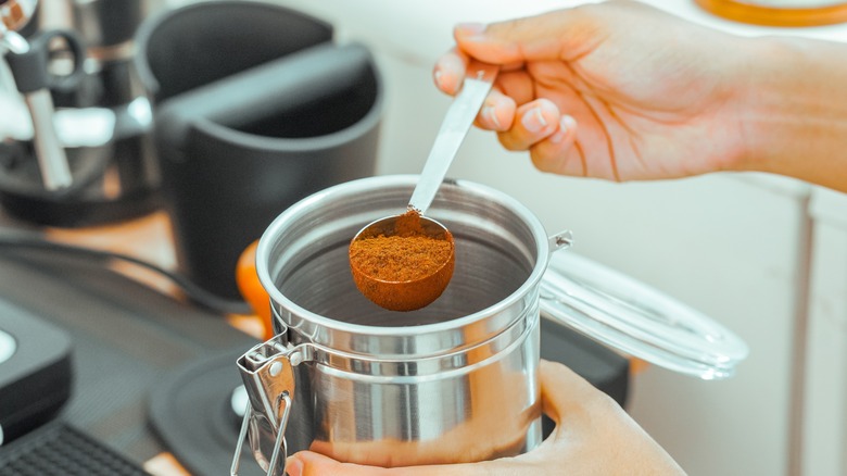 measuring spoon of ground coffee