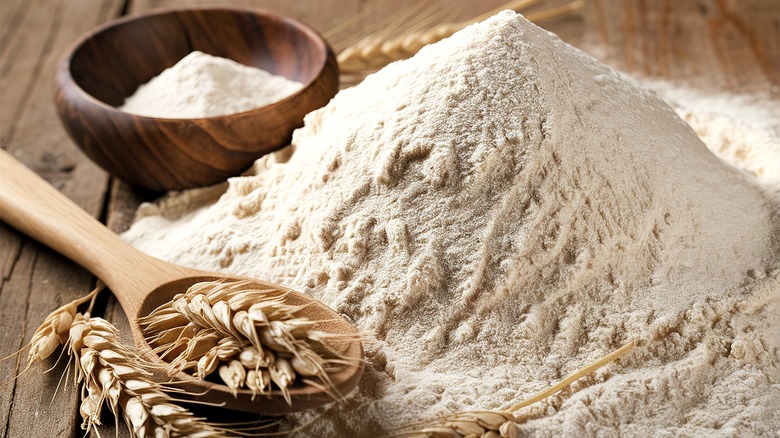 Wheat flour in a mound on a table