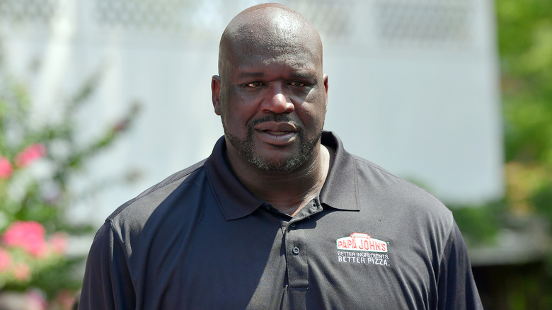 Shaquille O'Neal wearing a Papa John's t-shirt