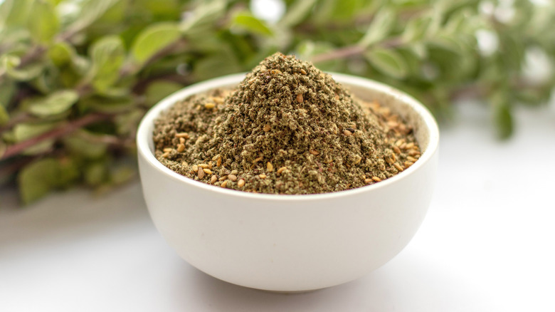 Za'atar seasoning in a white bowl