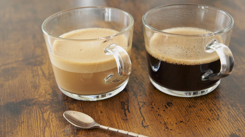 Cups of brewed nespresso drinks with and without milk