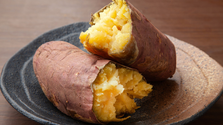 White sweet potatoes sitting on a plate.