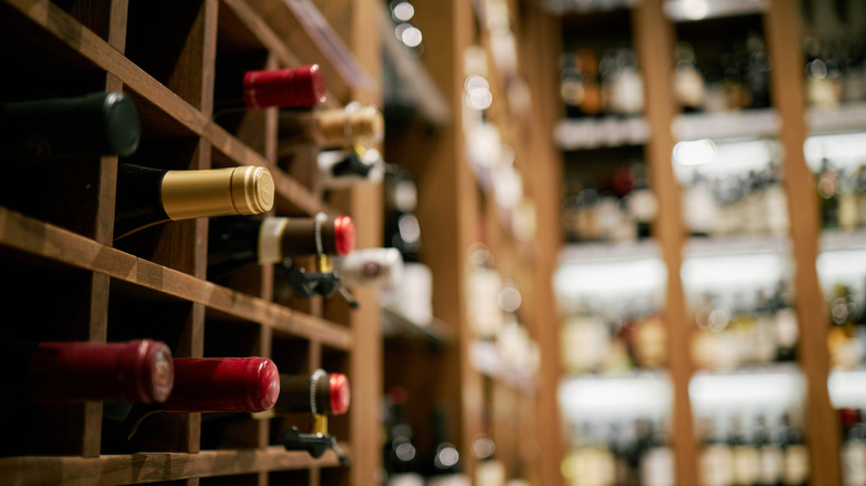 A sommelier wine rack displaying a variety of wine bottles