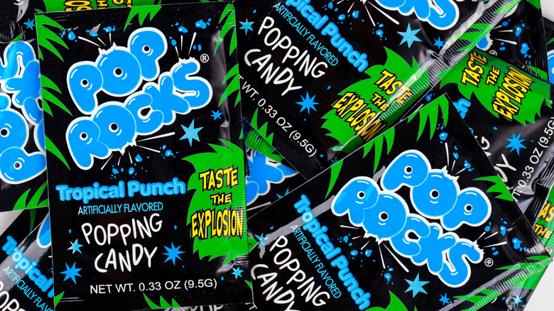 blue and green packs of tropical punch Pop Rocks