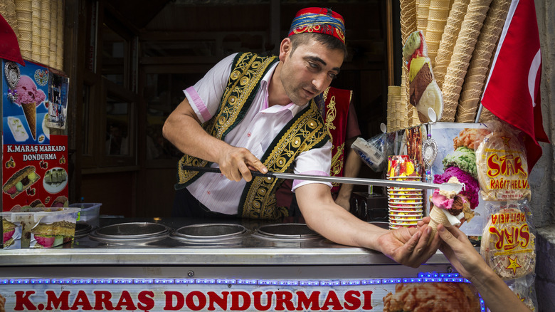 Dondurma vendor serving Turkish ice cream.
