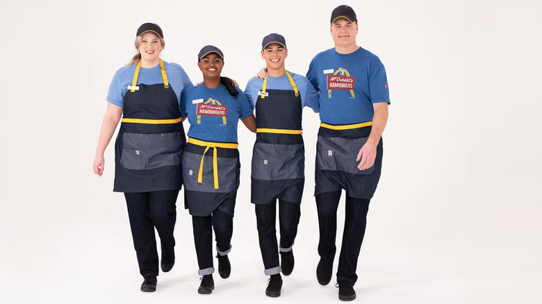 four American McDonald's employees arm-in-arm