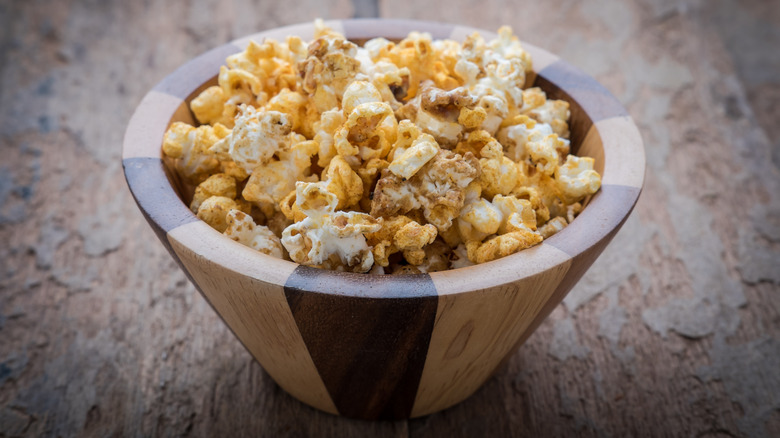 Smoked paprika popcorn in a wooden bowl