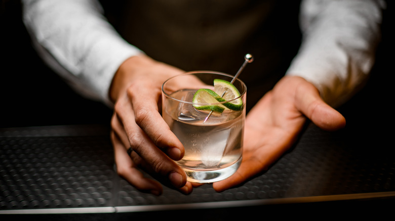 Bartender with a vodka cocktail