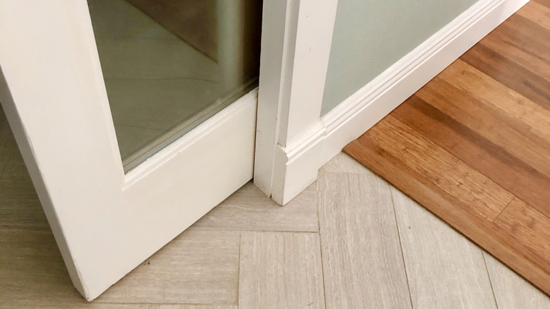 bottom of a sliding pocket door