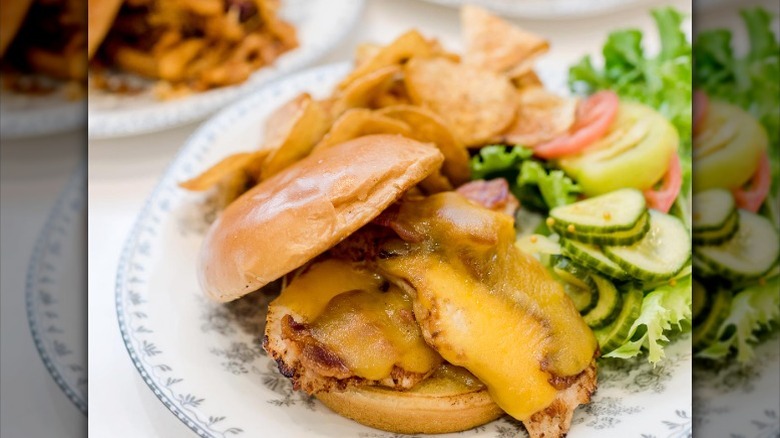 Ladd's Favorite Chicken Sandwich with chips and homemade pickles from The Pioneer Woman Mercantile