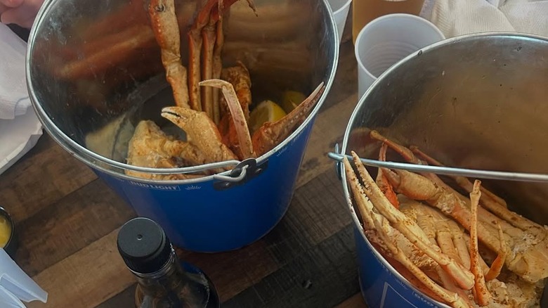 Crab legs in buckets at the Container Bar