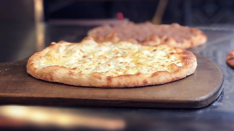 Two manoush breads at We're-Dough Bakery in Houston