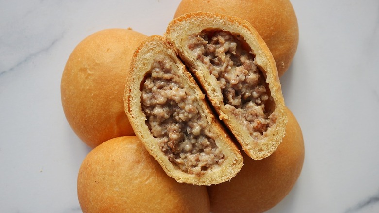 Cross-section of a sausage and gravy kolache from the Kolache Shoppe in Houston