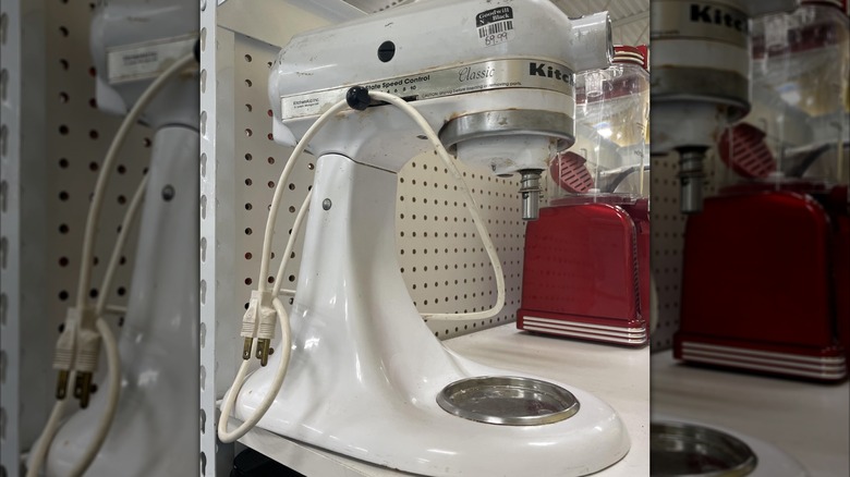 Rusted stand mixer at thrift store.