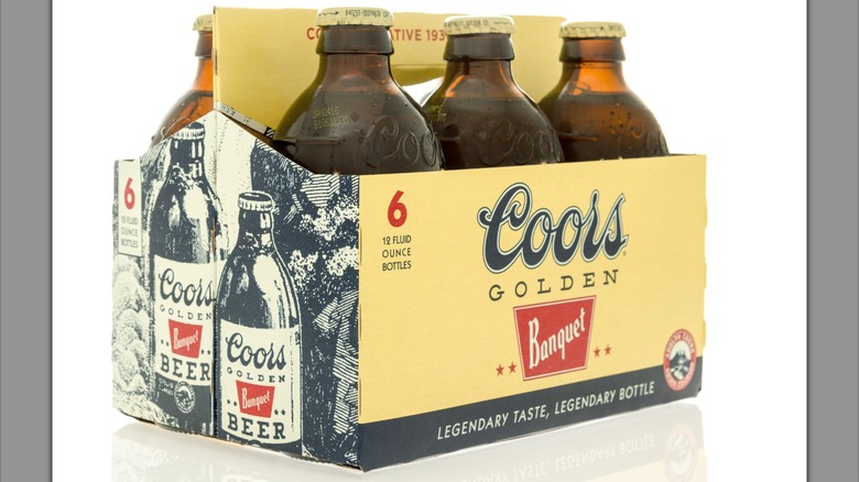 A six-pack of Coors Banquet bottles