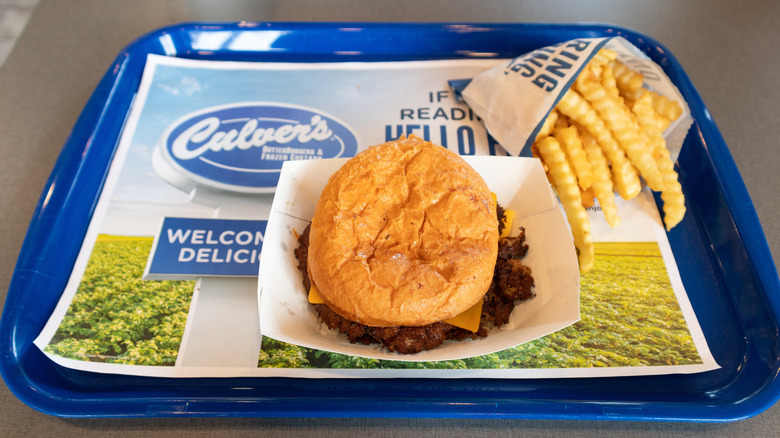 Culver's burger and fries on a blue tray