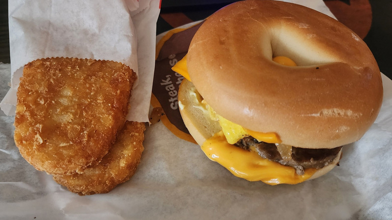 steak egg cheese bagel and hashbrowns