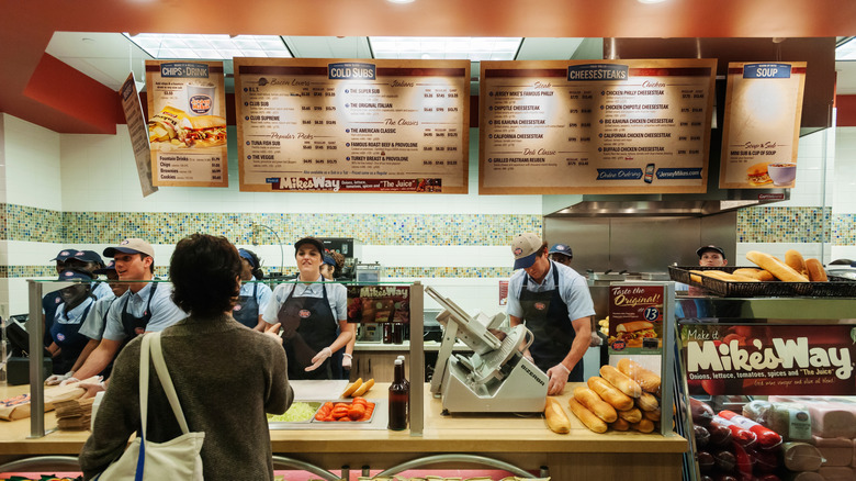 Person ordering food at Jersey Mike's counter