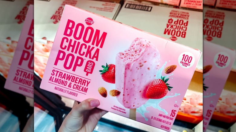 Hand holding ice cream bars box in Coscto