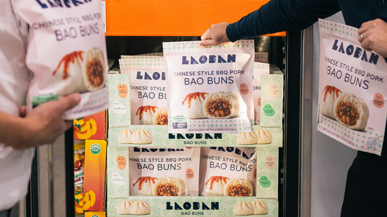 People buying pork buns from Costco fridges