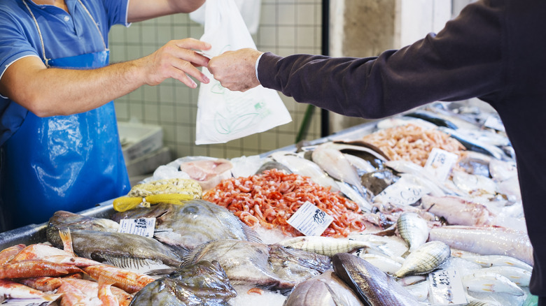 Fresh fish on ice at fish market